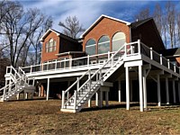 <b>Trex Transcend Spiced Rum Deck Boards with White Washington Vinyl Railing and Black Aluminum Balusters in Upper Marlboro MD 1</b>